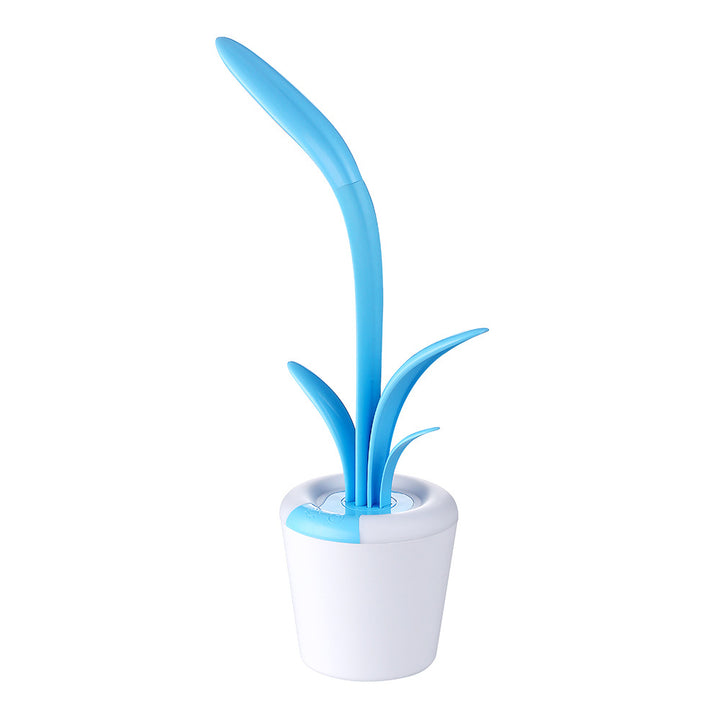 Lyserød plantelampe med lysende blad