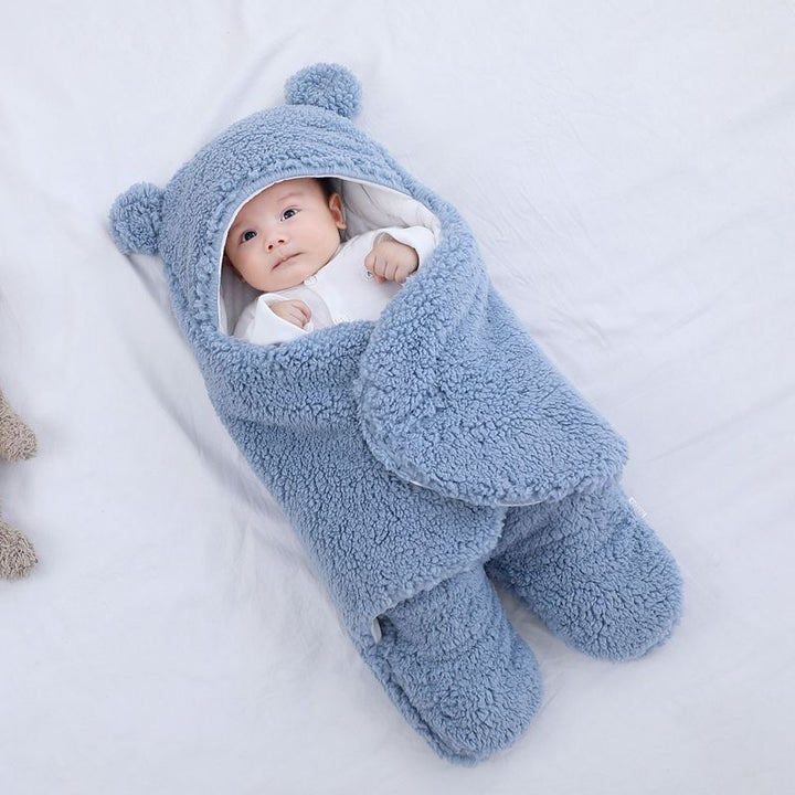 Babysovepose i teddyfleece med bjørneører