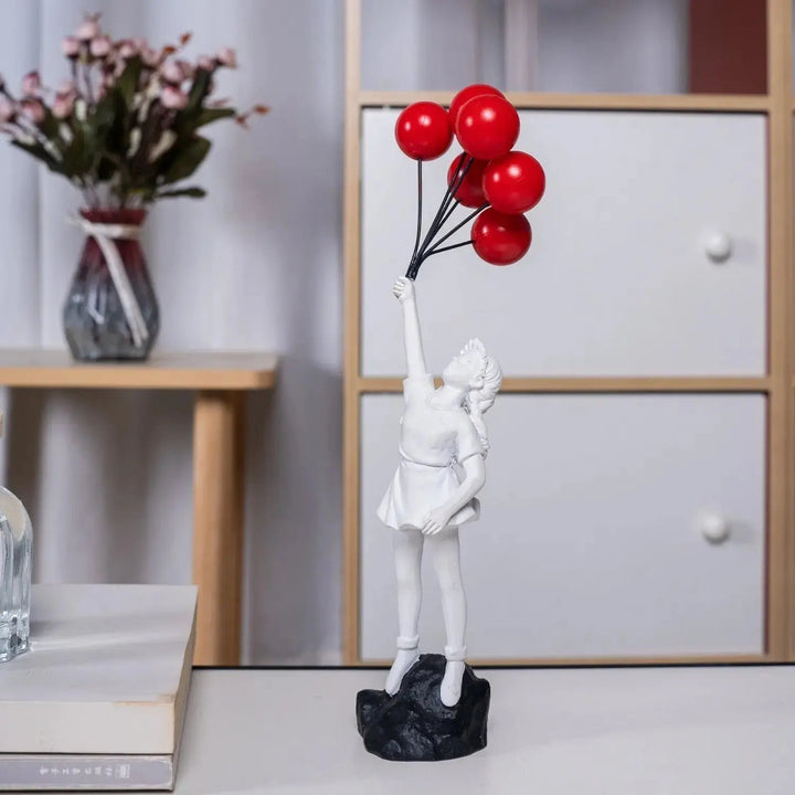 Banksy flyvende Ballonpige Statue