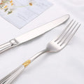 LuxSpoon | Elegant bestiksæt i gyldent design