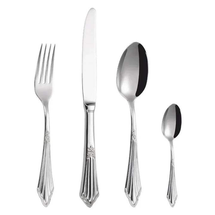 Elegant bestiksæt i guld design