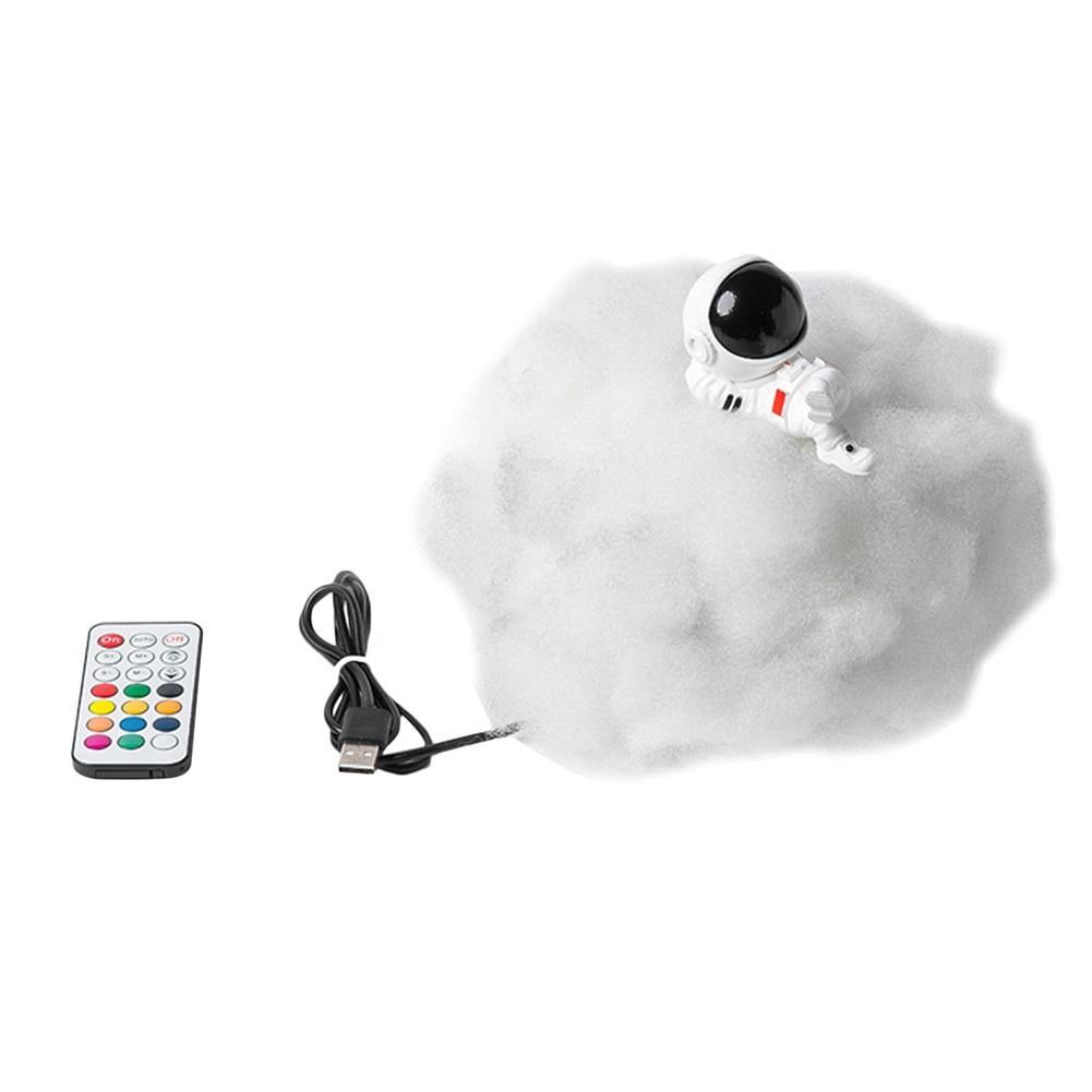 Astronaut farverige skyer natlys |